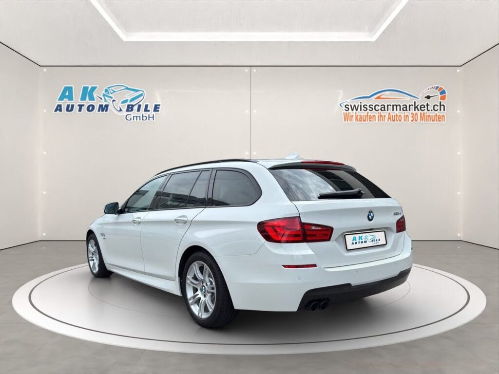 BMW 525d M Sport Touring Gebrauchtwagen-Angebote in der Schweiz – Rückansicht des eleganten Fahrzeugs