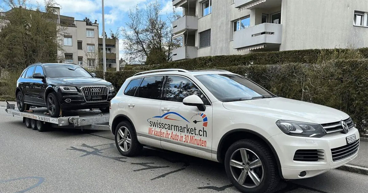 Hero für ankauf auto in Zürich mit moderner Fahrzeugreihe vor Glasfassade